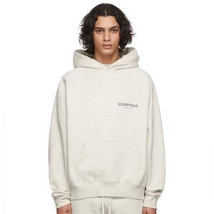 Essentials Men; Off-white pullover hoodie in “Light Oatmeal”, worn
